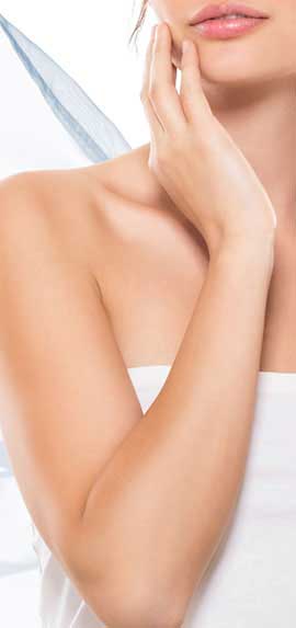 woman gently touchin face