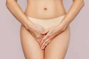 Woman experiencing labia discomfort